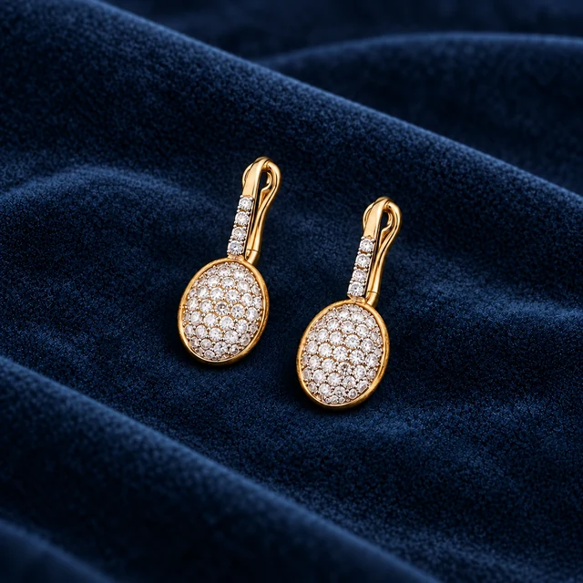 Nanis Ciliegine Baby Earrings on navy blue suede