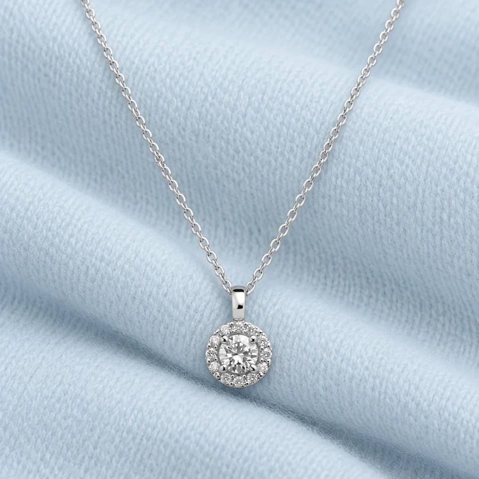 Jennifer Pendant on softly folded pale ice-blue cashmere
