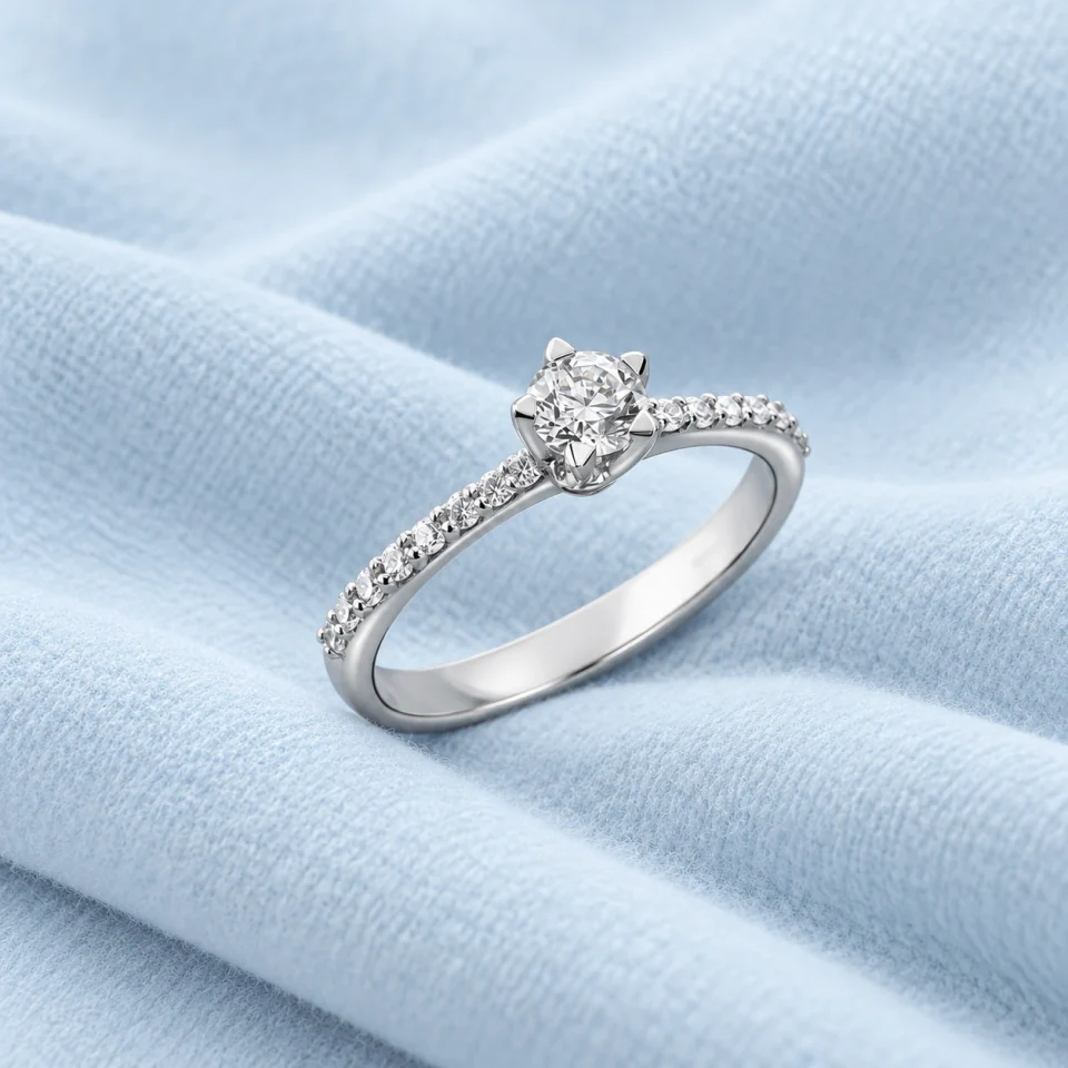 Royal Pavé solitaire from HRD Collection on pale ice-blue cashmere