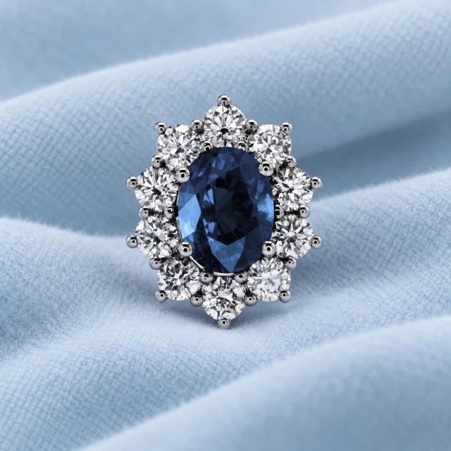 Sunflower Sapphire Earring on pale ice-blue cashmere
