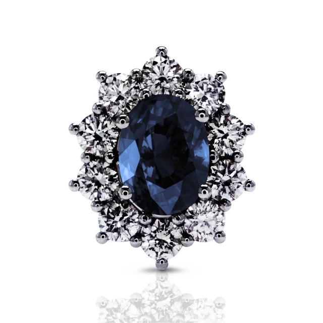 Sunflower earring with an oval blue sapphire and a flower halo of round diamonds