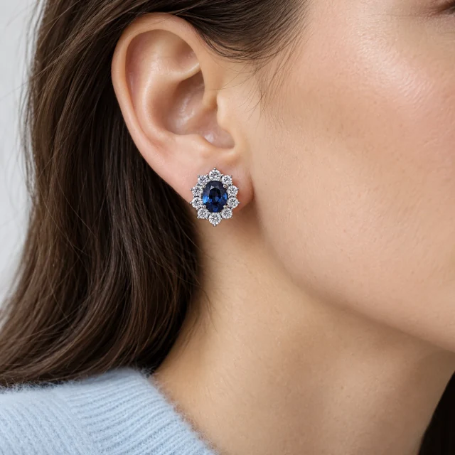 Sunflower Sapphire Earring, worn on the earlobe
