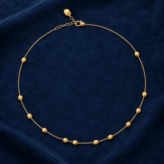 Nanis Soffio Necklace on navy blue suede